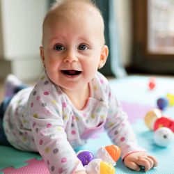 baby-toddler-playing-color-toys-at-home-or-nursery-9E8ZLYB-scaled.jpg